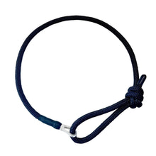 Hands-free leash with a knot on a white surface