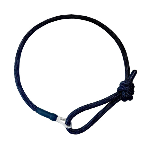 Hands-free leash with a knot on a white surface